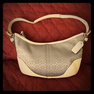 Coach white leather trim with Blue material.